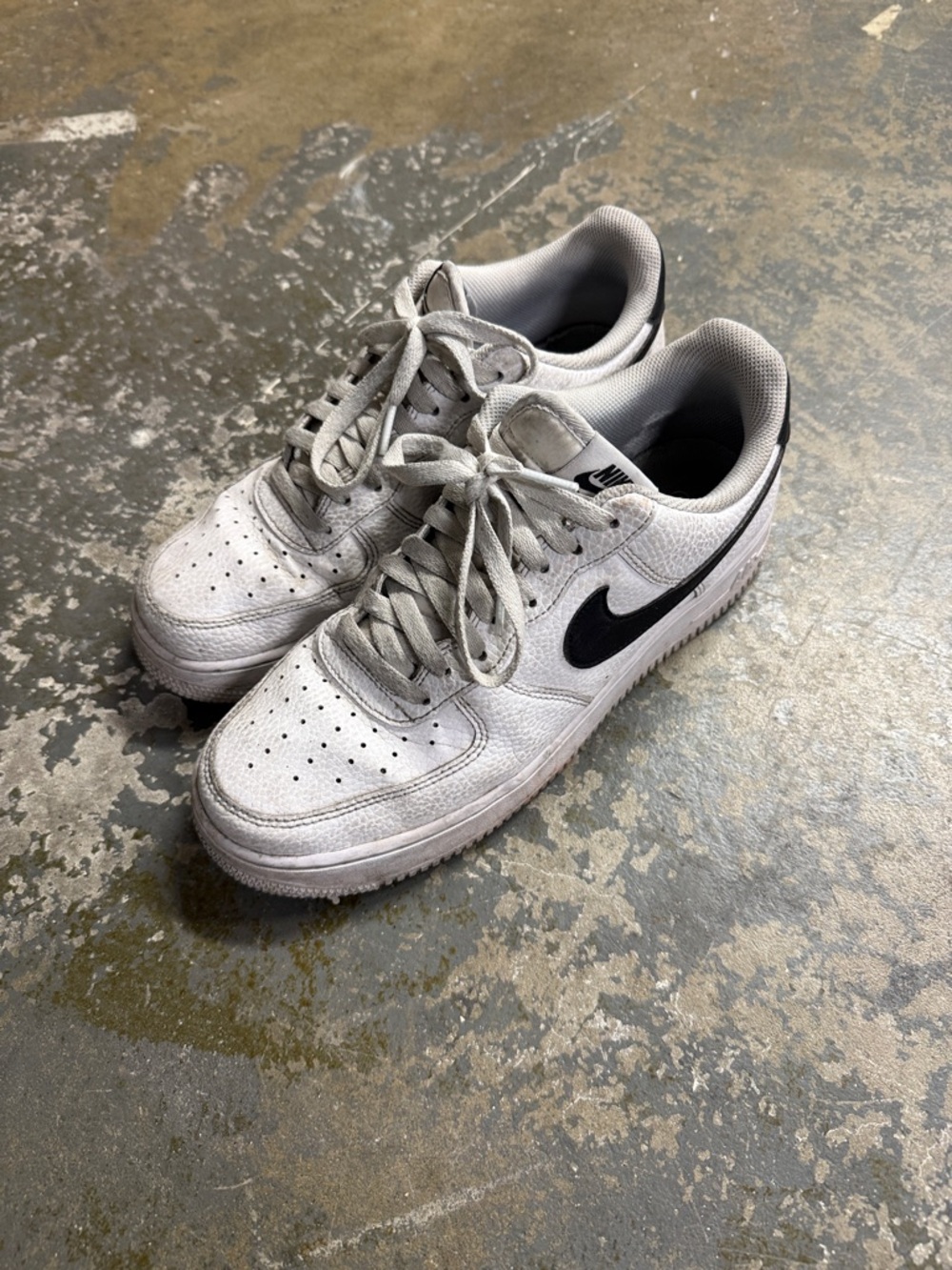 Nike White Sneakers with Black Swoosh